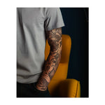 Questa copertina raffigura un re scheletrico dietro una gabbia, una donna in lutto con le lacrime agli occhi e delle rose che simboleggiano il peso del potere, il dolore e la bellezza nel dolore. Rappresenta il delicato equilibrio tra forza e vulnerabilità.